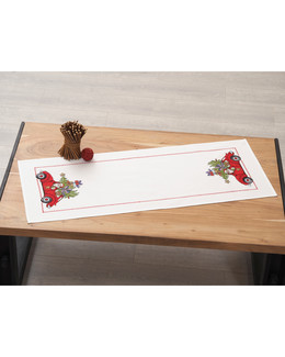 Kirjontapakkaus Kaitaliina Tonttu autossa